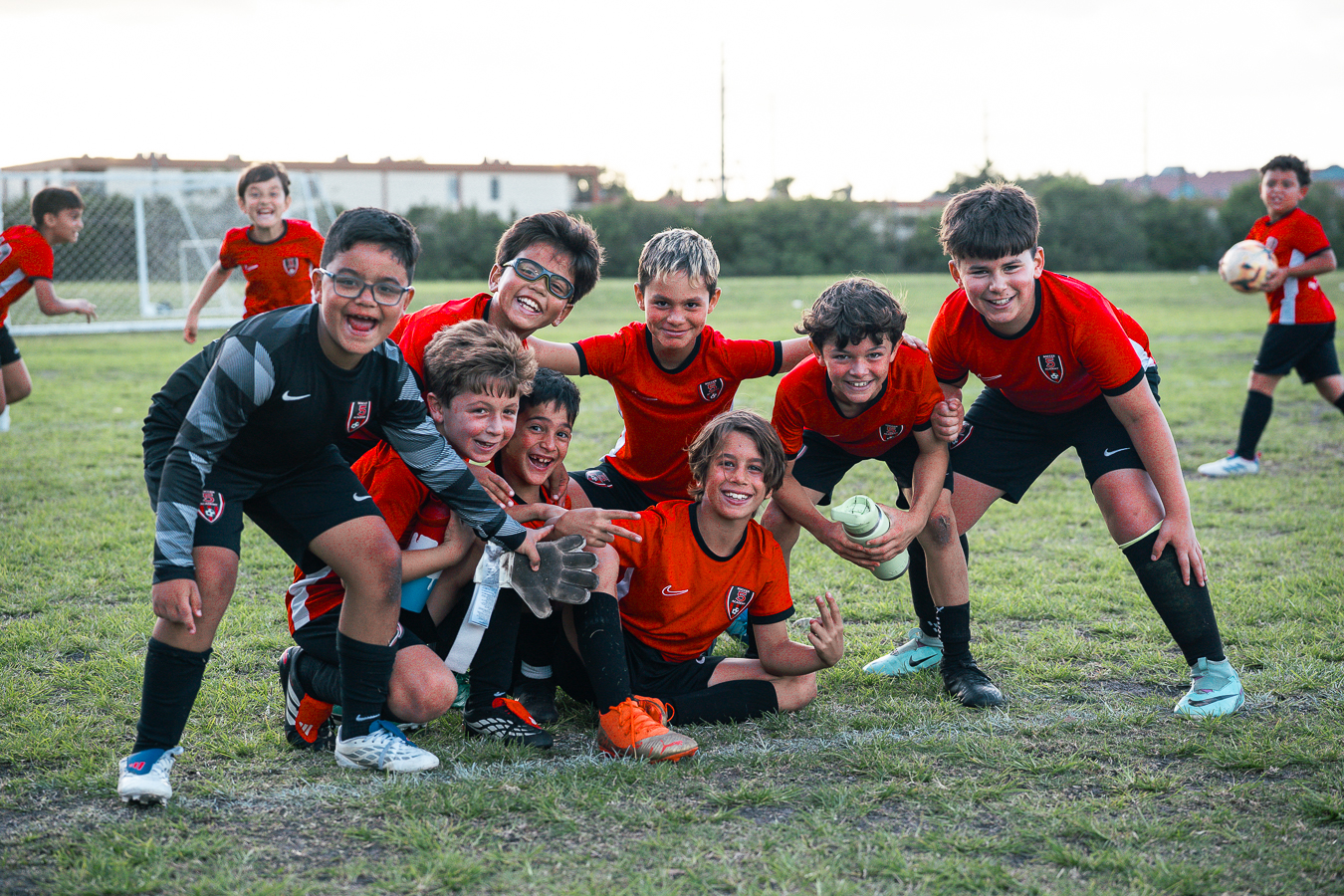Kids having fun at soccer summer camp